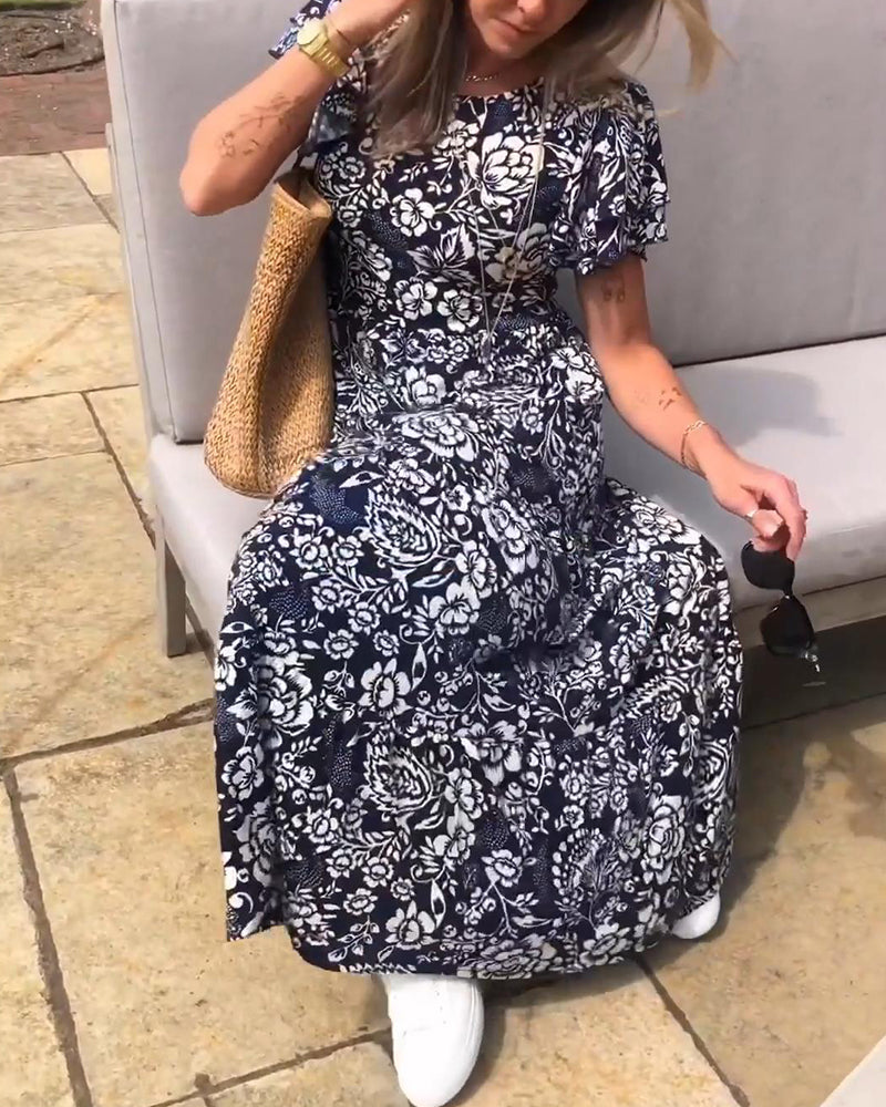 Ameline  | Lange jurk met korte mouwen en bloemenprint