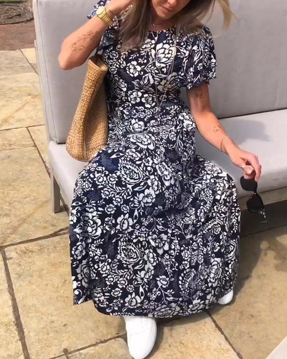 Ameline  | Lange jurk met korte mouwen en bloemenprint