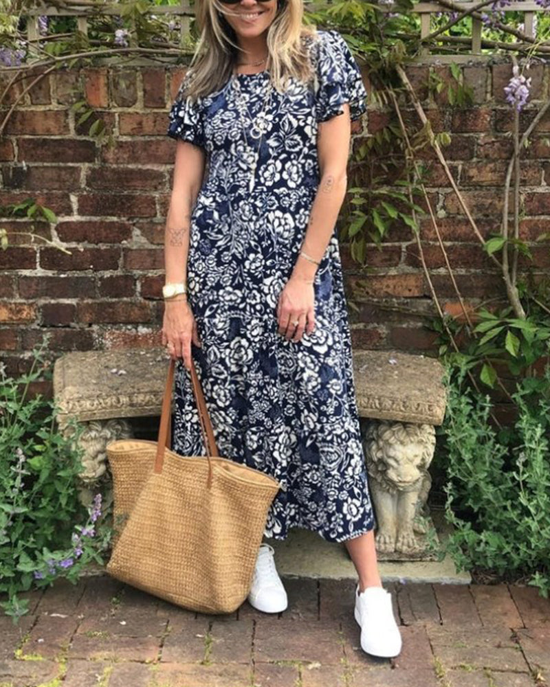 Ameline  | Lange jurk met korte mouwen en bloemenprint