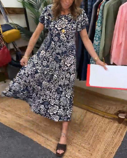 Ameline  | Lange jurk met korte mouwen en bloemenprint